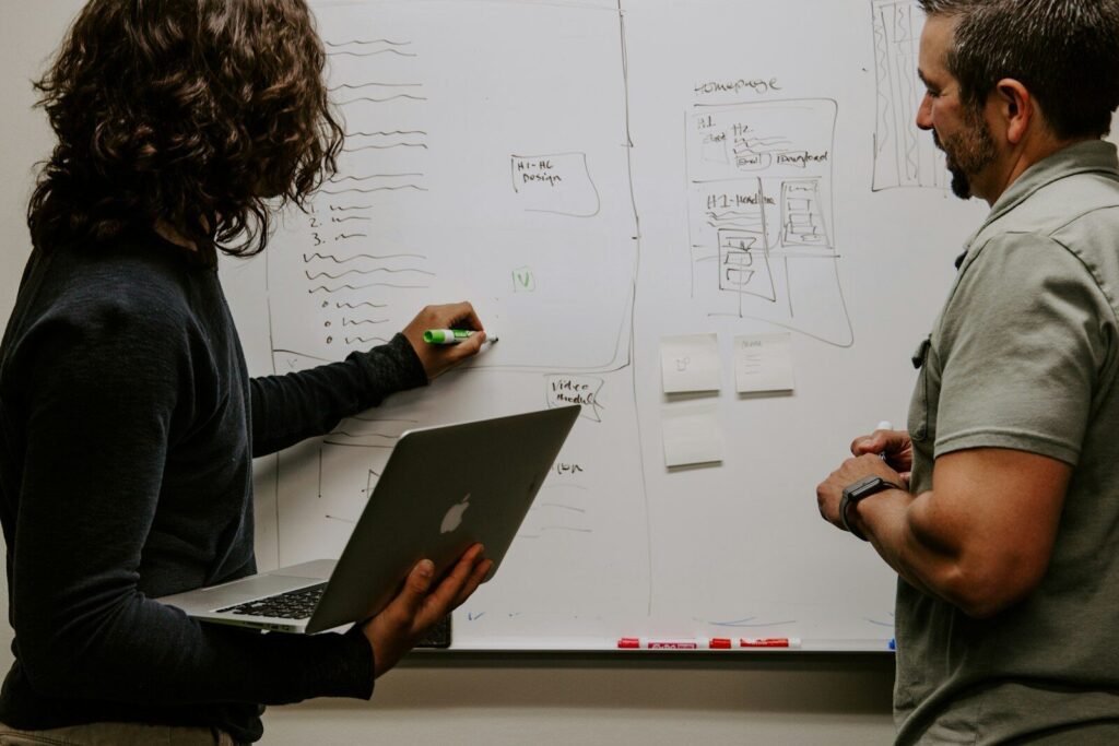 Fractional CMO leading marketing strategy session — Momentum AI Agency Brighton Michigan